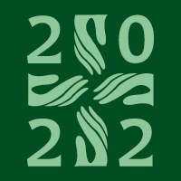 Kirkon diakonian logo: vihreällä pohjalla oleva risti, jonka ympärillä vuosiluku 2022.